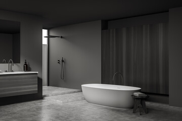 Fototapeta na wymiar Dark bathroom interior with sink and mirror, tub and douche
