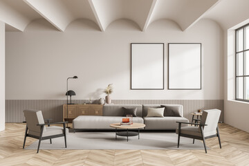 Bright living room interior with two empty white posters, armchairs