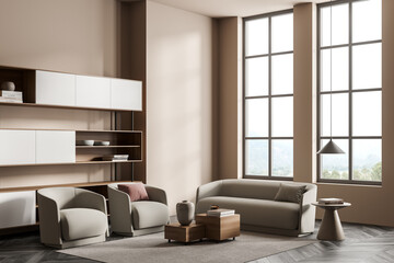 Light relaxing room interior with armchairs and sofa near window
