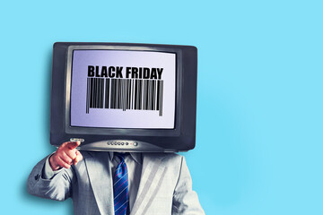 Concept Black Friday. A businessman with a TV instead of a head. Business.