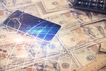 Double exposure of world map drawing over us dollars bill background. International concept.