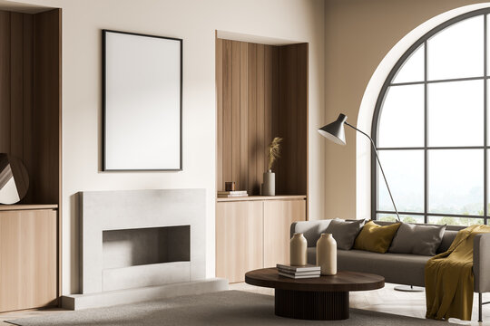 Corner view of beige living room with on trend details and canvas