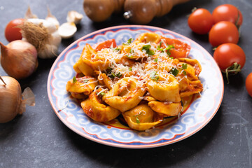 Italian tortellini pasta in tomato sauce