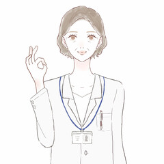 OKサインを出す中年の女性医師