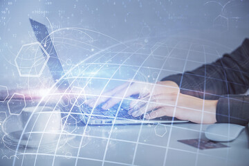 Double exposure of woman hands working on computer and world map hologram drawing. International technology business concept.