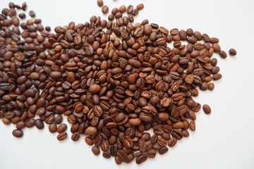 Roasted Coffee beans on white background. Coffee, Cafe, espresso design elements. 