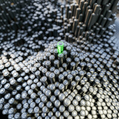 Infinite alkaline batteries on a plane with one best winning; original 3d rendering