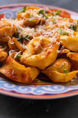 Italian tortellini pasta in tomato sauce