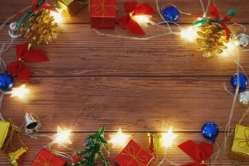 Christmas themed wallpaper with wooden table background.