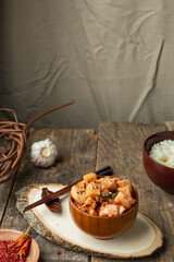 Korean daikon radish appetizer. Fermented radish (Kkakdugi). Free space.