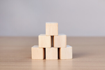 wooden cube on wooden table, mockup, template, copy space for text