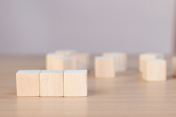 wooden cube on wooden table, mockup, template, copy space for text