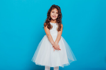 beautiful little girl in white dress as princess queen