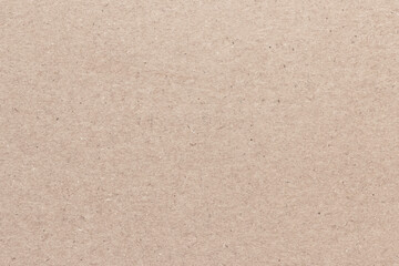 A sheet of light brown cardboard.