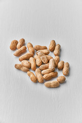Fototapeta na wymiar Image of bunch of peanuts on a table