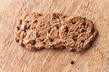  Delicious chocolate cookies on a wooden table