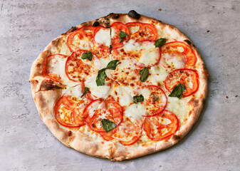  Delicious italian pizza on a concrete surface