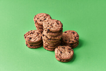  Delicious chocolate cookies on a green background