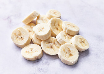  Slices of banana on a marble table
