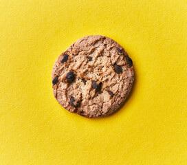  Delicious chocolate cookie on a yellow background