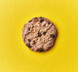  Delicious chocolate cookie on a yellow background