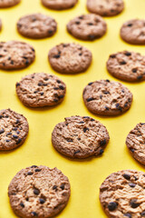  Delicious chocolate cookies on a yellow background