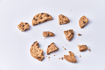  Delicious broken chocolate cookies isolated on a white background