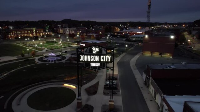 Johnson City, Tennessee USA, Aerial View of Shinning Sign With Town Name and Cityscape at Night