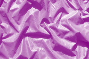 Metallic Velvet Violet texture background. Crumpled fabric.