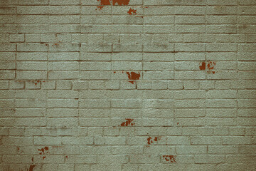 red brick wall which was painted in white colour. Some places paint peel off and now wall is two coloured. Rustic vintage old grungy pattern, Red and white brick background. Dilapidated brick wall.