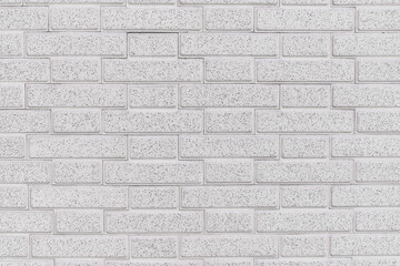 Brick wall texture with cracked tiles and cement. Classic brickwall surface background