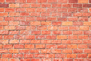 Brick wall texture with cracked tiles and cement. Classic brickwall surface background