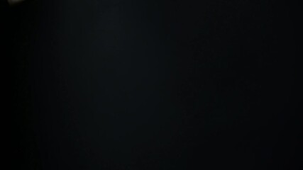 Slow flow towards euro banknotes currency movement background, money flying endless flow on black background. - Powered by Adobe