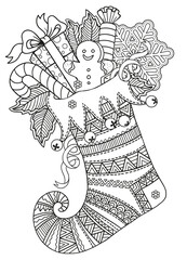 Fototapeta premium Cute knitted Christmas sock with sweet gifts from Santa Claus. Vector mandala coloring page for adults. Page for coloring book and Christmas design