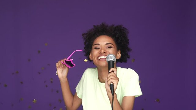 Lady star shape sunglass sing fall confetti isolated purple color background