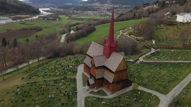 Traditional Medieval Norwegian Stave Church In Ringebu Municipality In Innlandet, Norway - aerial drone shot