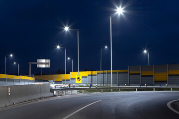 highway exit at night with led streetlights - 471833939