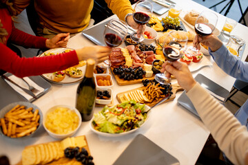Father having breakfast with his son and daughter at home, closeup on the food