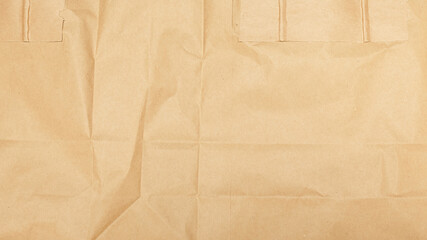 Rumpled kraft paper or cardboard texture for background