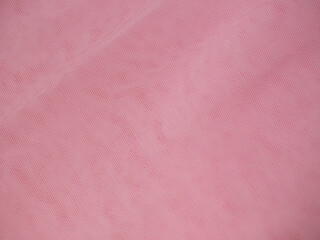 Texture de tulle rose uni pour fond et arrière-plan