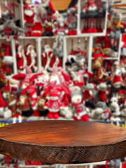 Wooden board on the background of the interior of the supermarket. Sharpness on the board. Place for product advertising. Free space for design and goods. Layout for products.