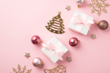 Top view photo of row composition christmas tree decorations pink balls gold bell pine snowflake shaped ornaments small stars white gift boxes with pink ribbon bows on isolated pastel pink background