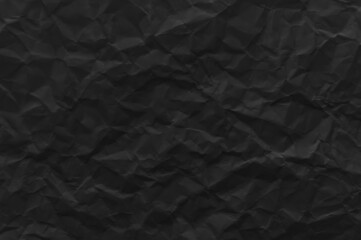 Texture of black crumpled paper for background
