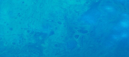 Abstract marbleized effect background. Blue creative colors. Beautiful paint. Sea marbling textures