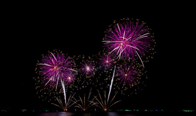 Fireworks at the sea in night time for celebration of new years