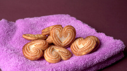 Obraz na płótnie Canvas Delicious homemade heart shaped cookie on a color background. Top View. Place for text.