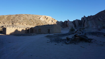 stone house in a dessert in argentina route 40