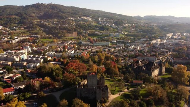 Drone fly above guimares Portugal old town during a sunny day with old medieval castle