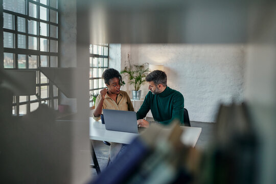 Multiracial Couple Talking With Their Psychotherapist On A Video Call