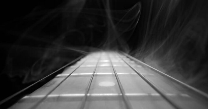 Guitar fretboard with sliding in black and white